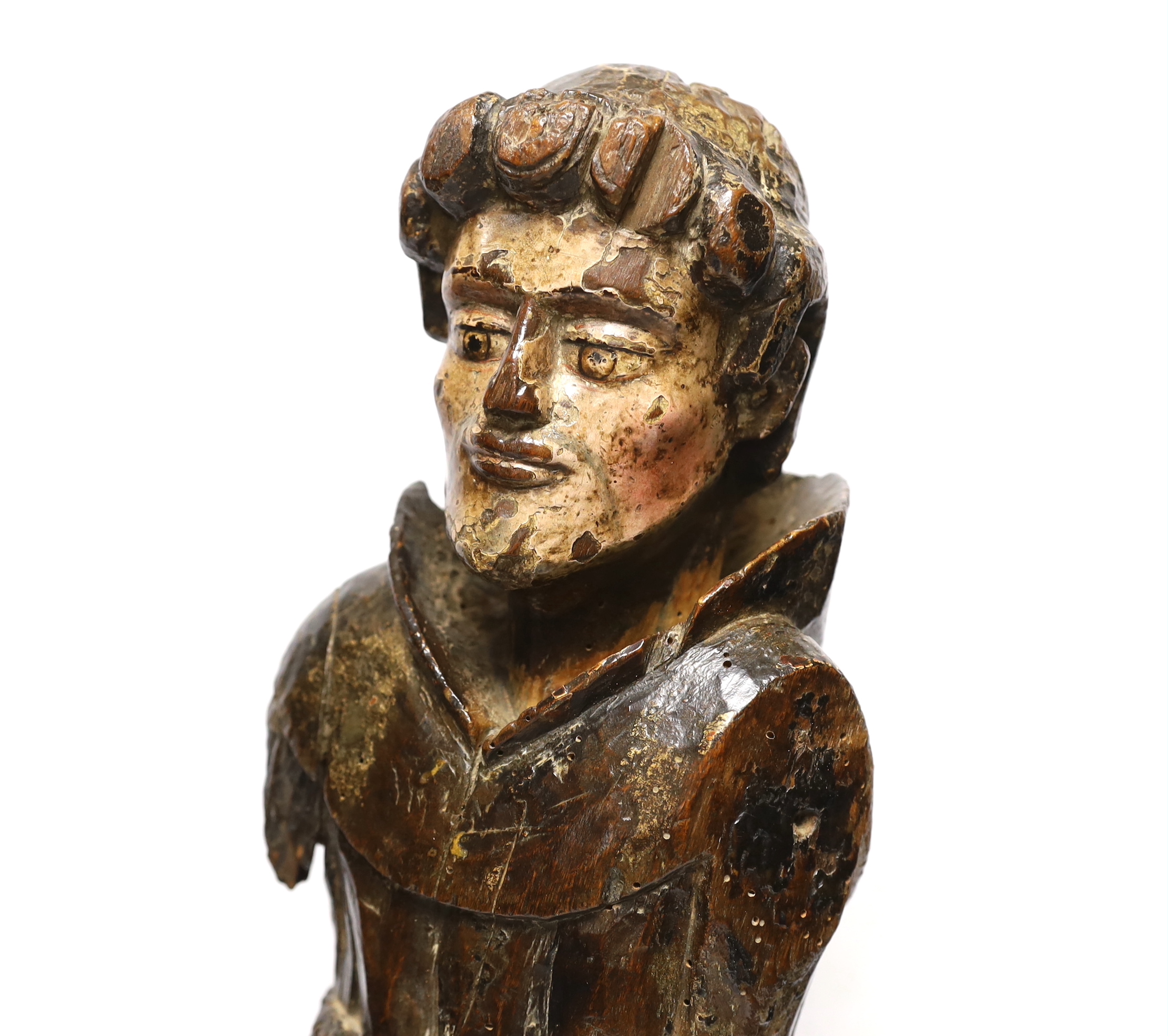 An oak carved monk with polychrome face, 54cm high